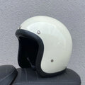Retro style half motorcycle helmet in glass fibre construction for electric bike commuting