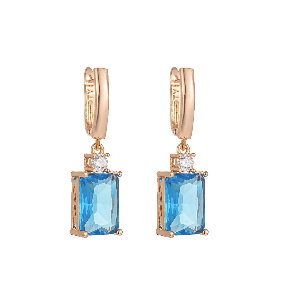 Square geometric copper earrings with electroplated gold finish showing quadrilateral shape design