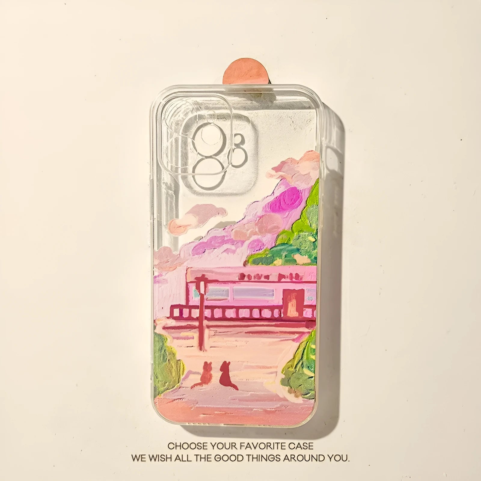 White silicone iPhone case with a colourful cartoon illustration of two cats on the back.