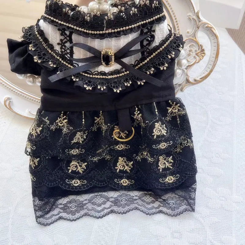 Golden ruffled gothic princess skirt costume being worn by a small dog or cat.