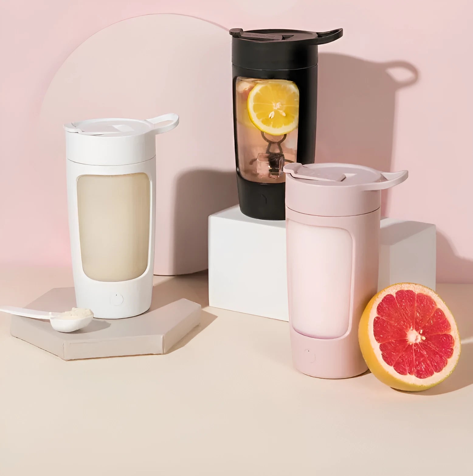 Portable automatic blending cup in chosen colour, showing measuring lid and compact size.