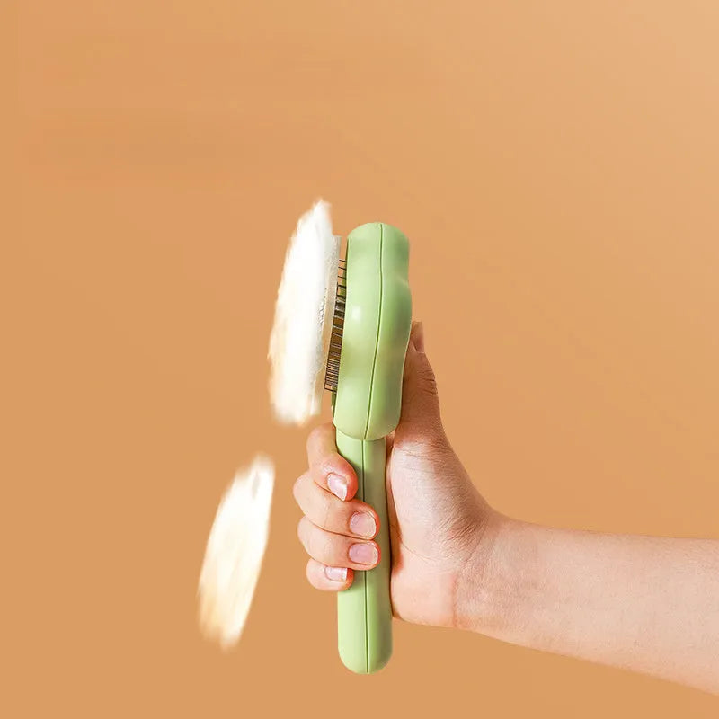 Self-cleaning cat grooming comb with stainless steel needle teeth in green colour option