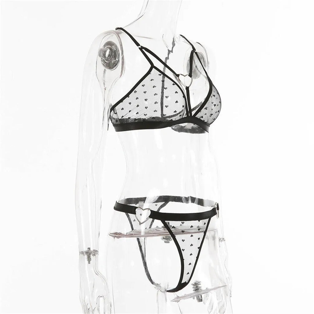 Ladies black mesh spandex two-piece athletic set with matching top and pants