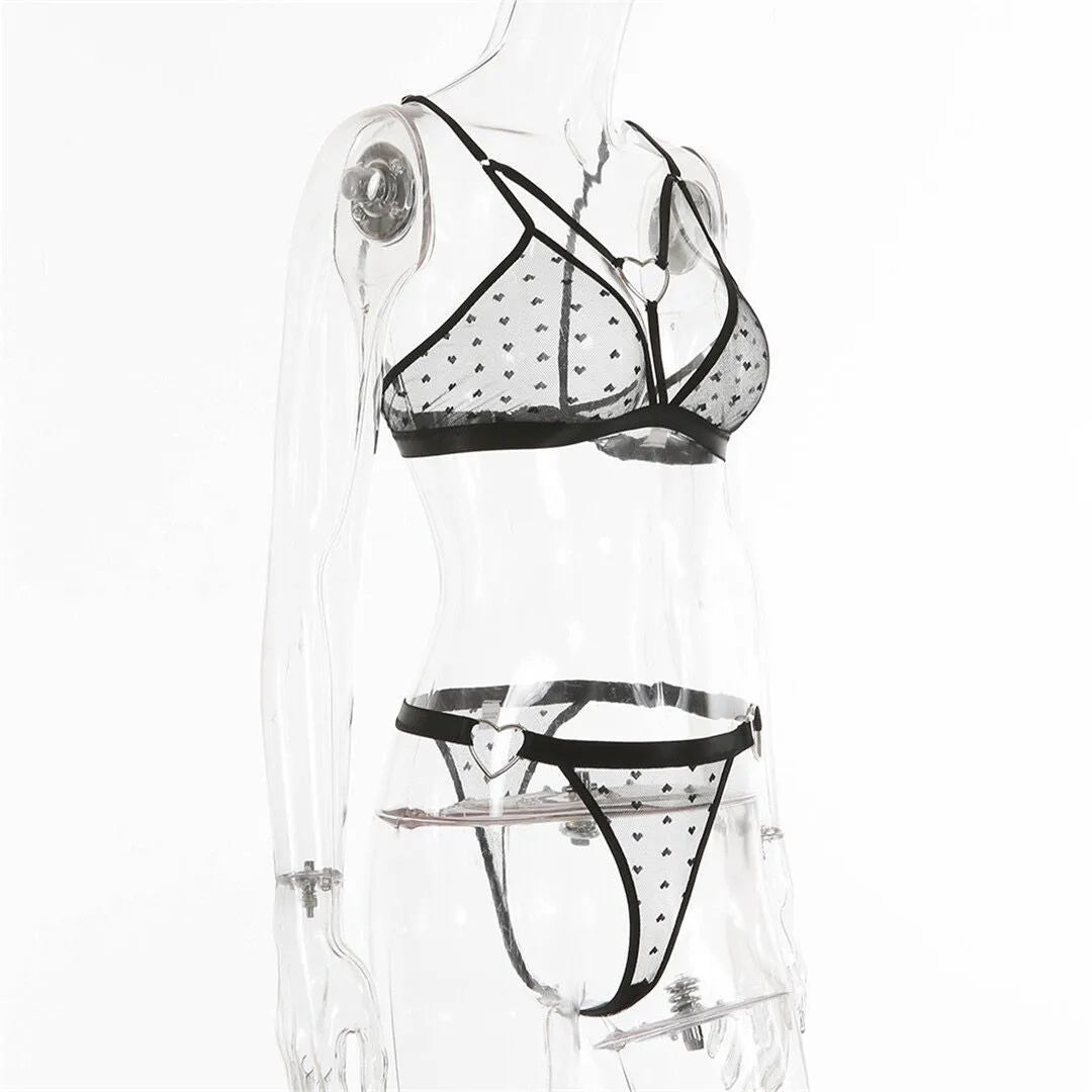 Ladies black mesh spandex two-piece athletic set with matching top and pants