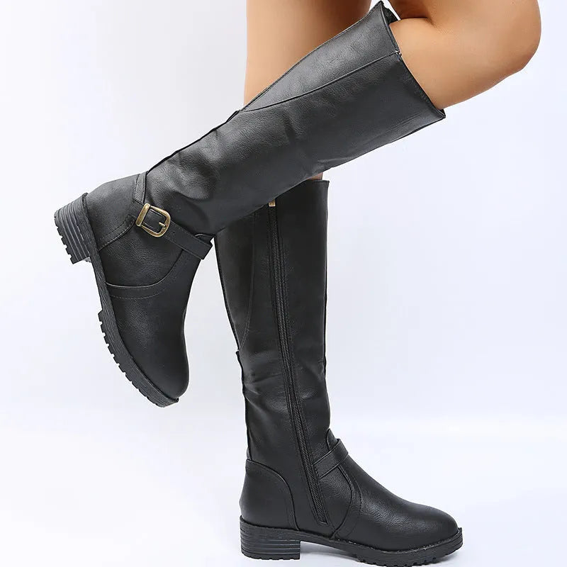 Yellow women's high knight boots with a square heel, round toe, and side buckle detail.