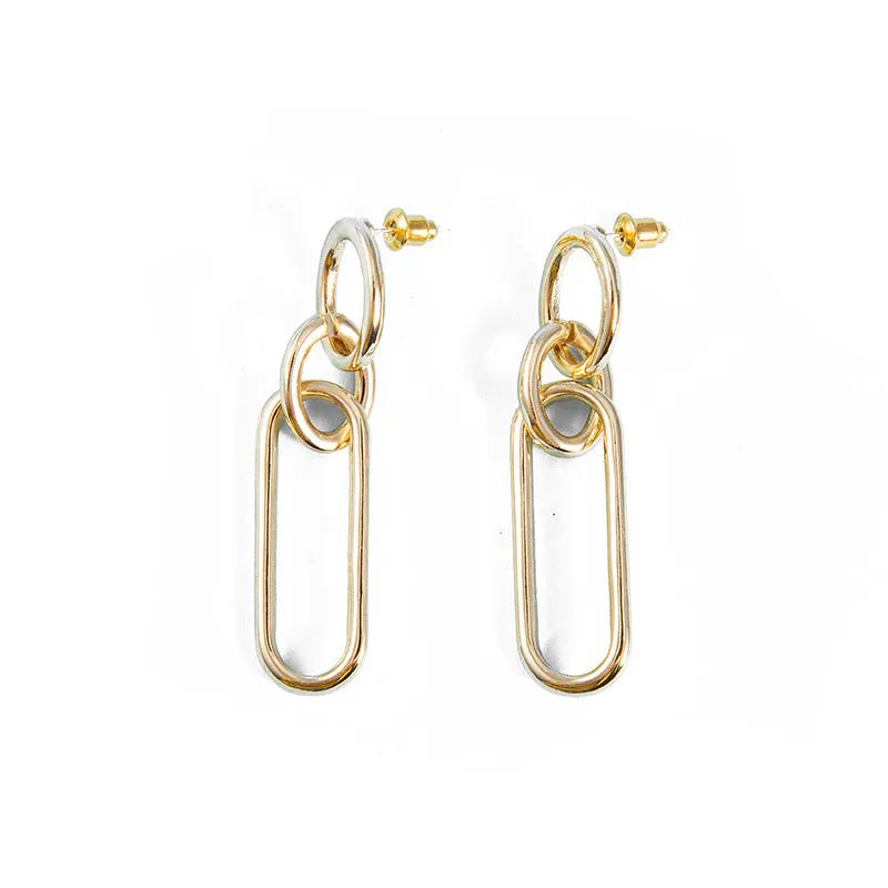 Geometric sterling silver needle hoop earrings with ring and line design elements