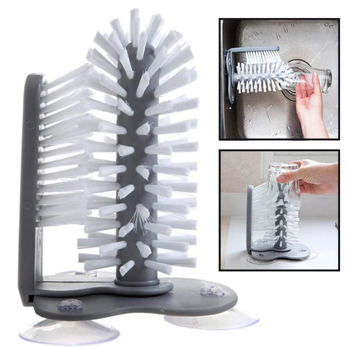 Grey 2 in 1 cup scrubber with double-sided bristles and three suction cups on the base for cleaning glassware.