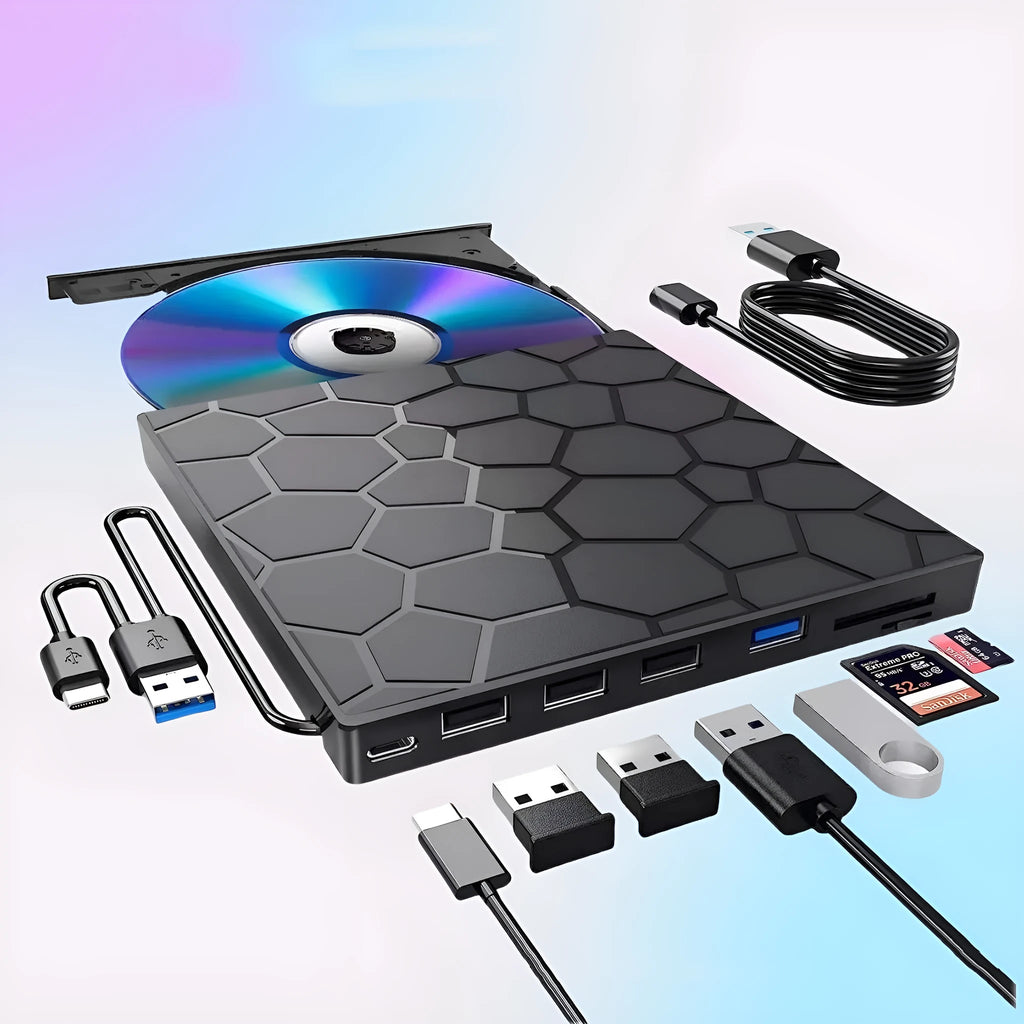 Black external USB CD/DVD drive on a desk next to a laptop