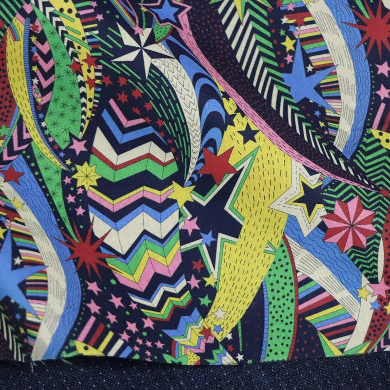 Blue cotton fabric with a detailed digital print of plants and flowers, showing a 1m x 1.45m piece.