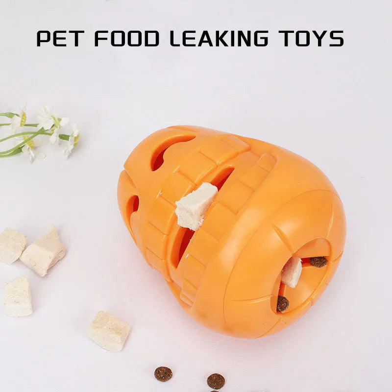 Orange Halloween pumpkin shaped interactive dog chew toy with treat dispensing funnel