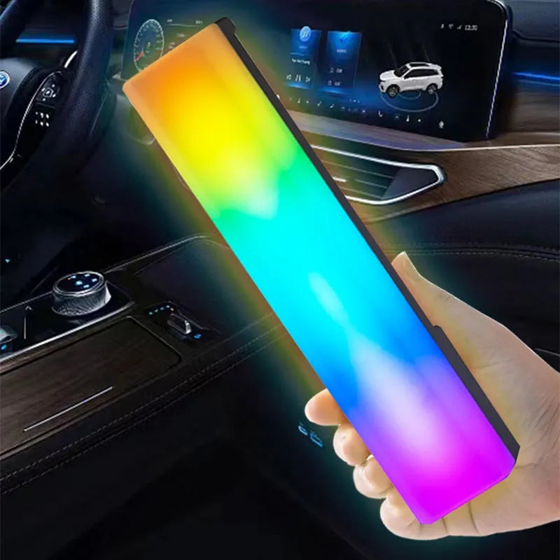 3D RGB music rhythm ambiance lamp in black or white shell on a tabletop.