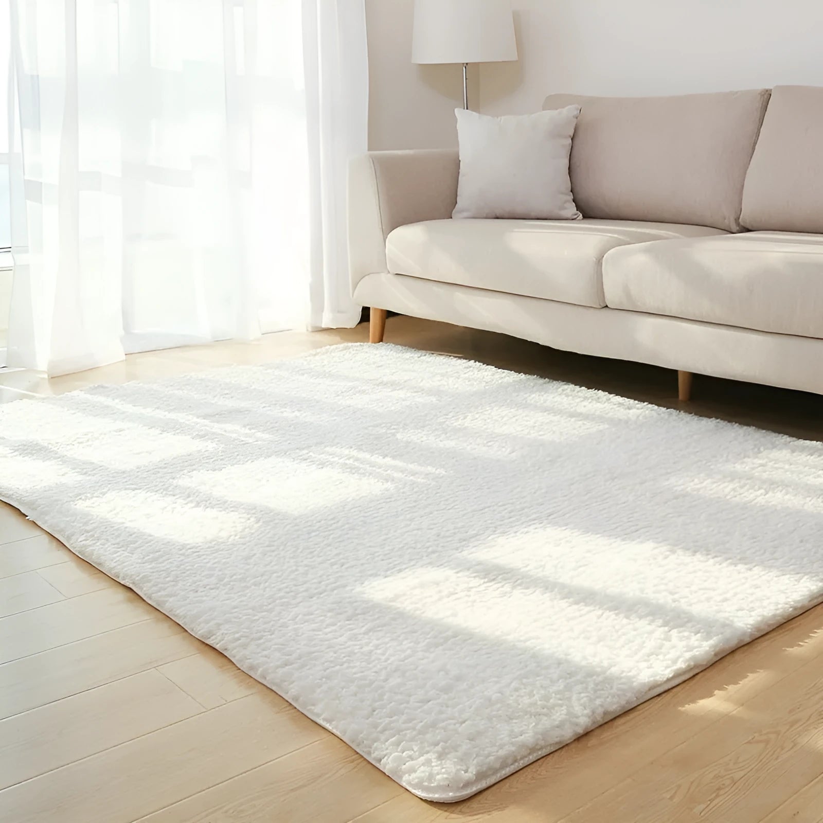 White fluffy plush area rug with rectangular shape and non-slip dot bottom