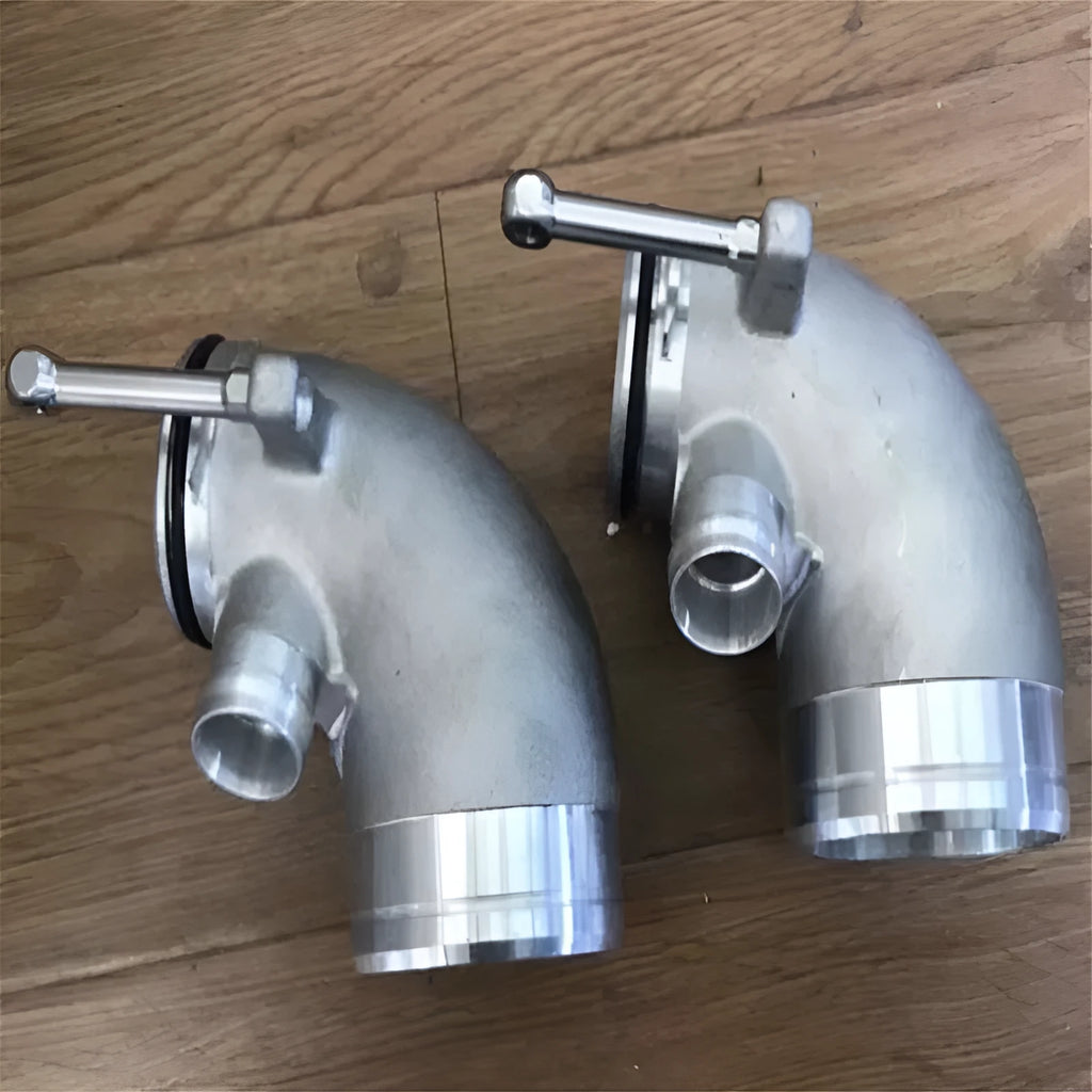 Aluminium alloy 90 degree turbo elbow pipe for automotive lateral engine applications