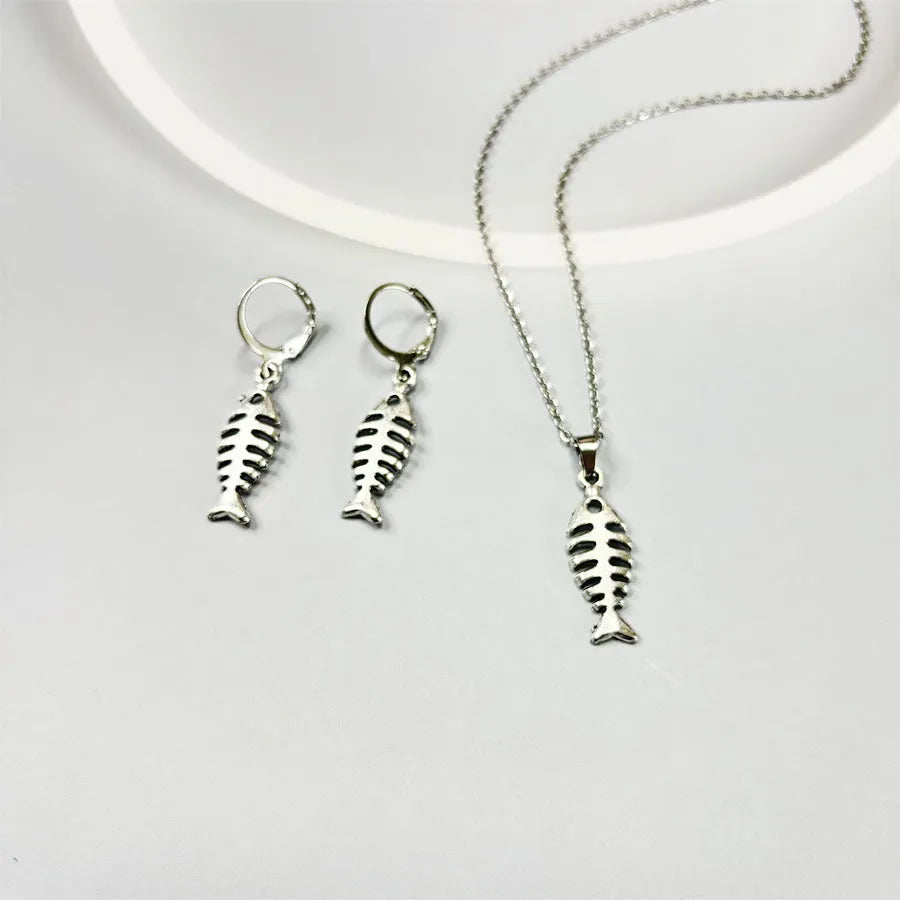 Women's retro-style fishbone pendant necklace and matching earrings set on an O-shaped chain.