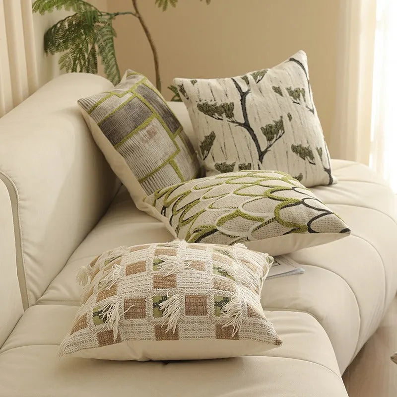 Square pillow cover with woven plant pattern in Nordic style, shown on a sofa as a waist pillow.