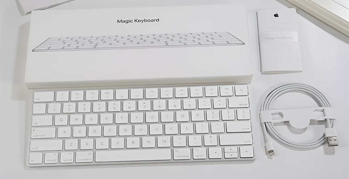 White Apple G6 Bluetooth wireless keyboard with ultra-thin metal casing on desk