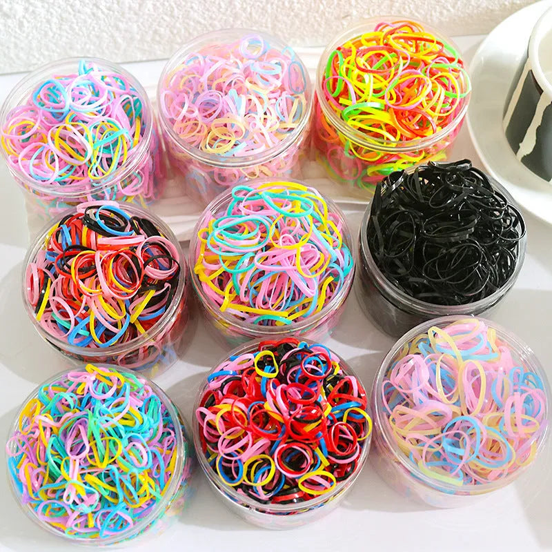 Multi-colour TPU baby hair bands in a reusable container, 300 or 600 piece pack.