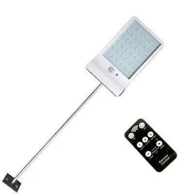 IP65-rated outdoor solar garden light with LED illumination in black or white colour options