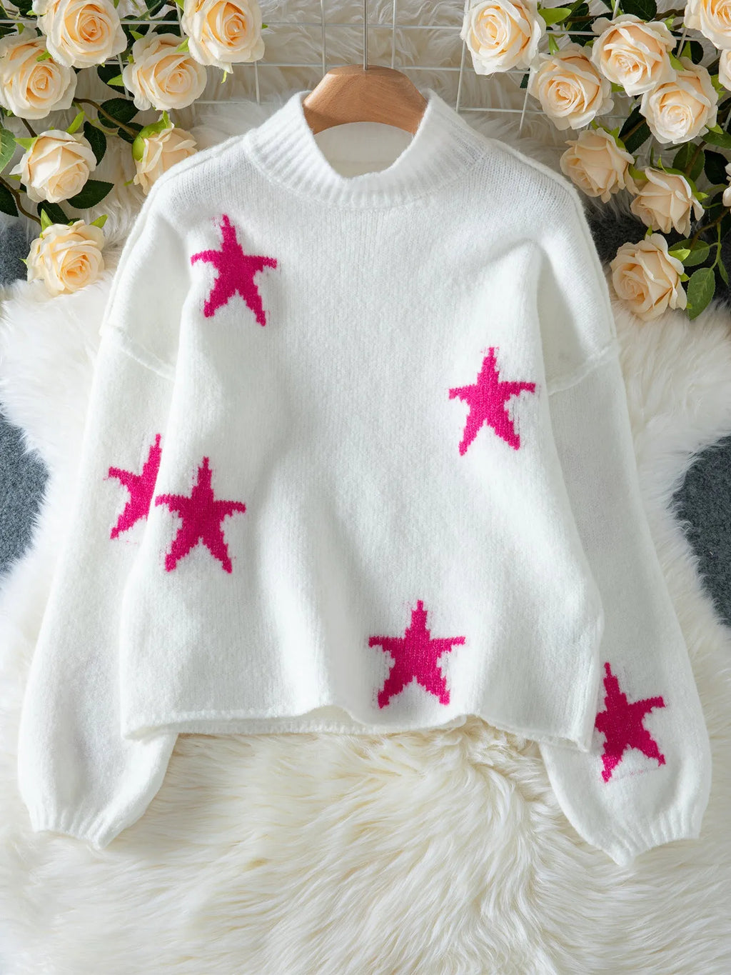 White women's turtleneck pullover with contrast star pattern on imitation velvet fabric