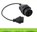 BMW OBD2 diagnostic adapter cable showing 20-pin plug and standard 16-pin female socket