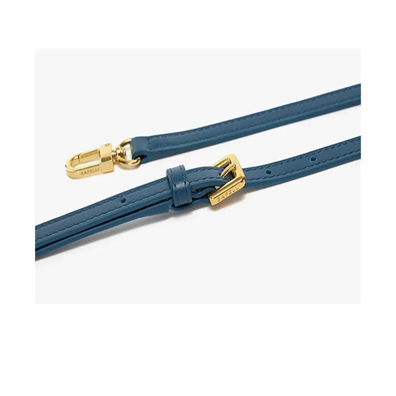 Women's leather cross-body wing bag with buckle closure in four colour options