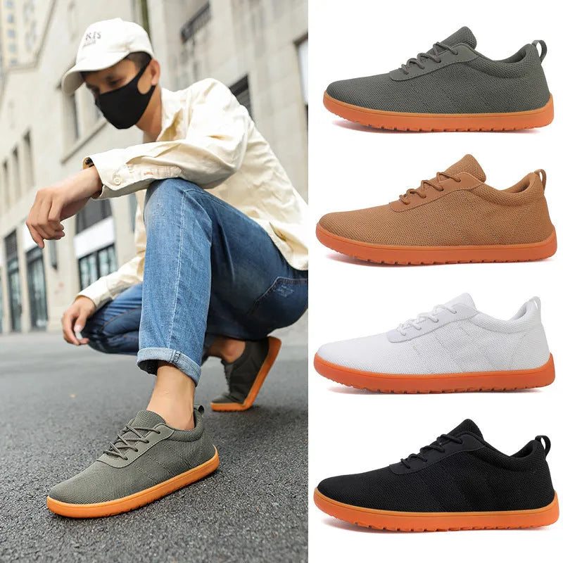 Men's low-top casual walking shoes in black with Flyknit upper, round wide toe, and rubber sole.