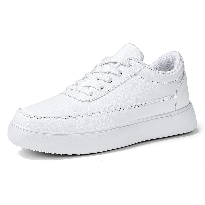 Women's white leather lace-up casual flat shoes on a light background.