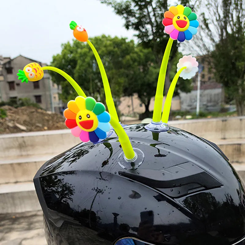 Yellow silicone sunflower helmet decoration with brown centre and suction cup mount