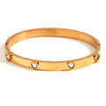 Stainless steel women's bracelet with micro-inlaid peach heart design in electroplated golden finish