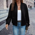 Women's solid black casual zip jacket with faux pockets and long sleeves