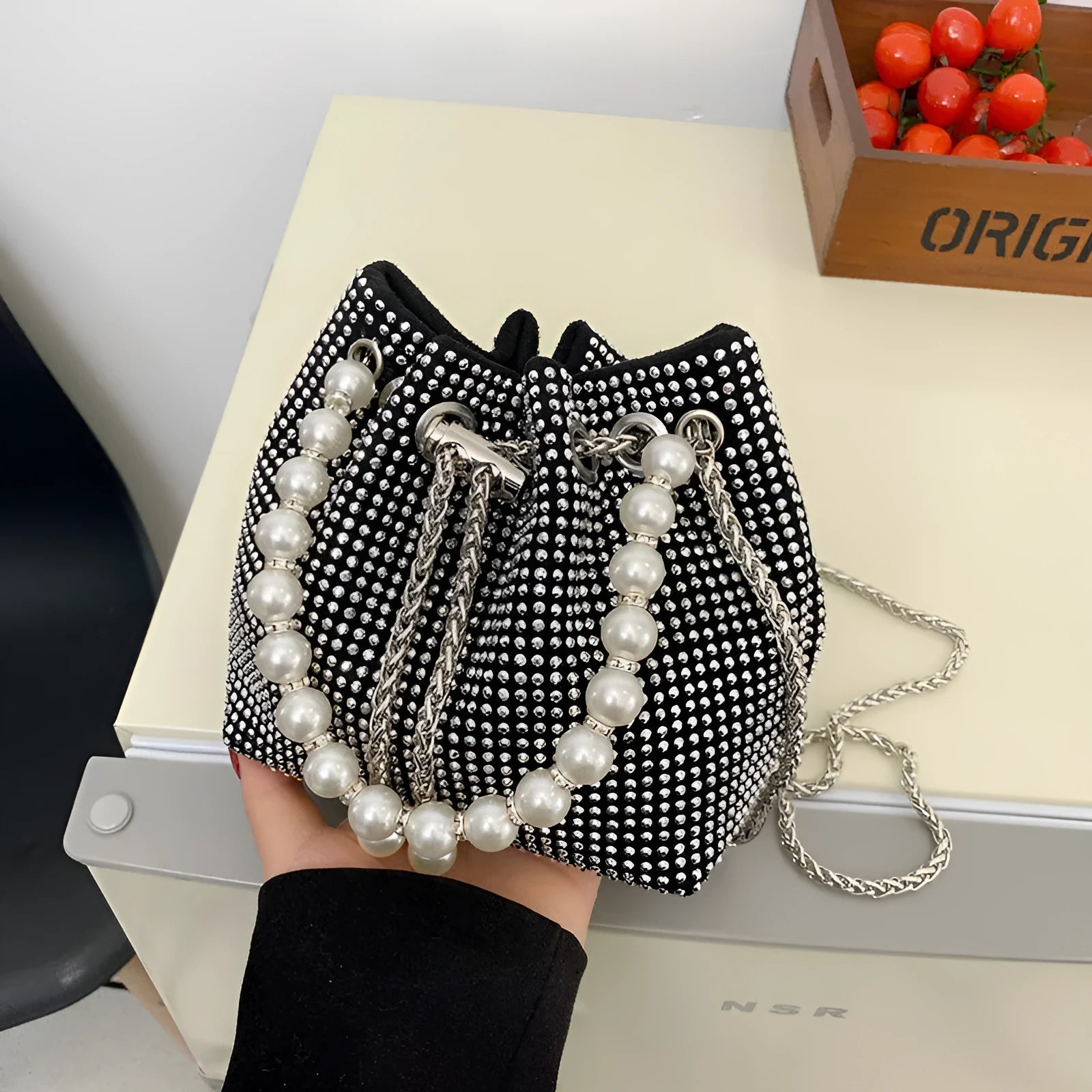 Western style diamond crossbody bag with chain strap in bucket shape design