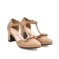 Women's apricot coloured sandals with a chunky 6.5cm heel, bow tie decoration, and a single buckle strap.