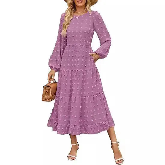 Women's long sleeve dress with ruffled sleeves and high waist in a solid colour.