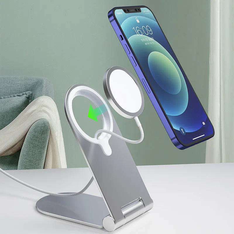 Silver vertical adjustable magnetic bracket for iPhone 12 mounted on dashboard