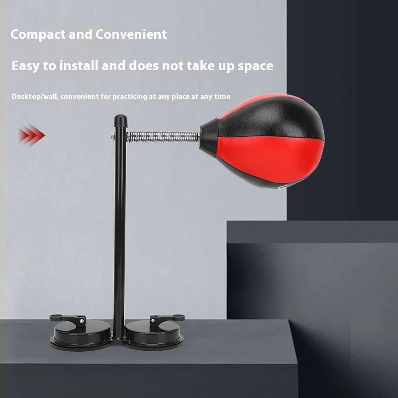 Pear-shaped inflatable boxing ball with red and black colour scheme mounted via double suction cups