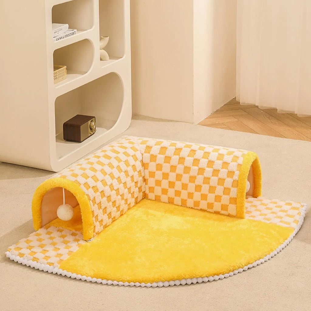 XL sized fan-shaped plush pet bed with integrated tunnel, shown in coffee colour with a non-slip granular base.