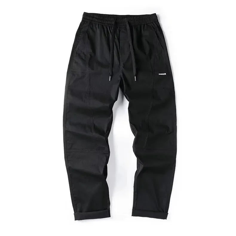 Women's milky white antibacterial cotton wide-leg casual trousers on a hanger.