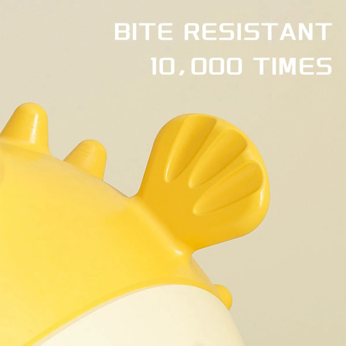 Yellow fish-shaped vinyl dog chew toy with textured surface for teeth cleaning