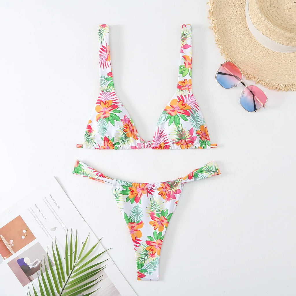 Women's floral print bikini swimsuit in blue colour with multi-colour pattern