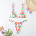 Women's floral print bikini swimsuit in blue colour with multi-colour pattern
