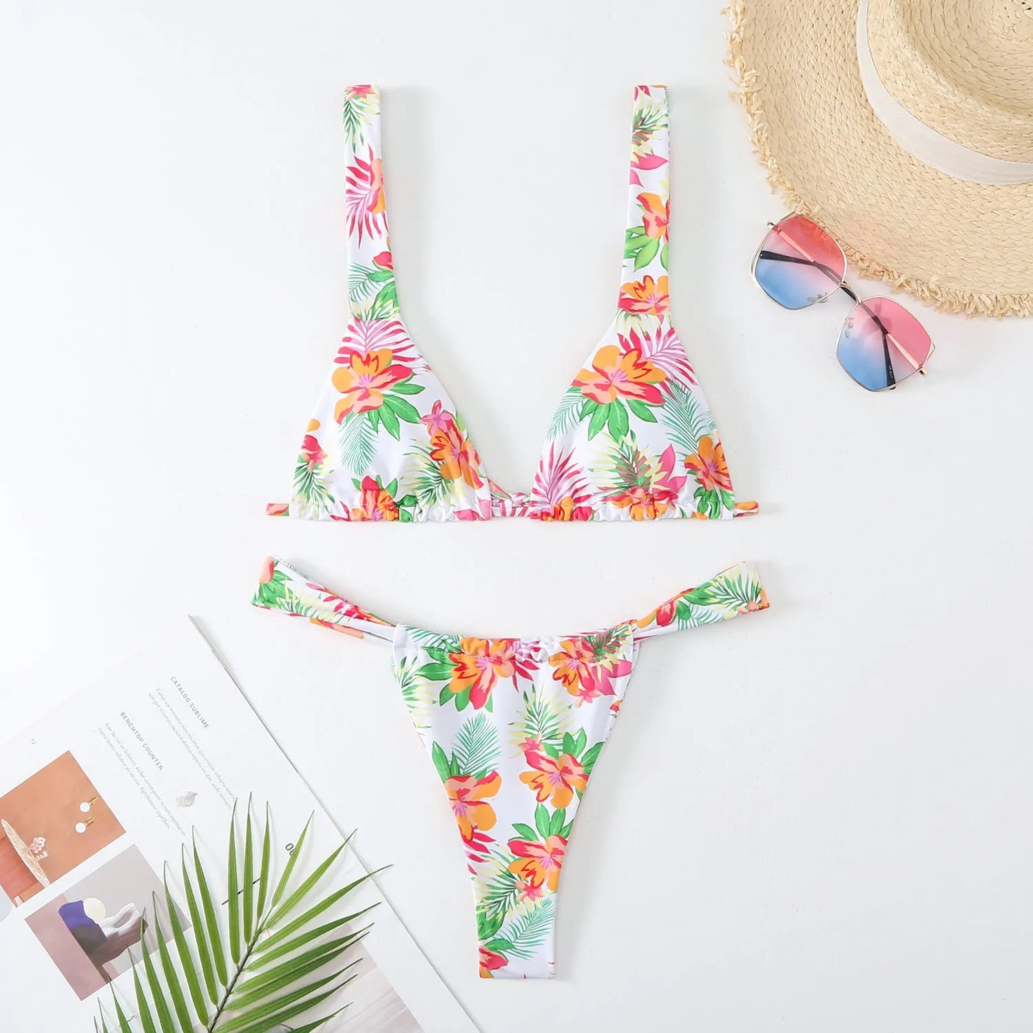 Women's floral print bikini swimsuit in blue colour with multi-colour pattern