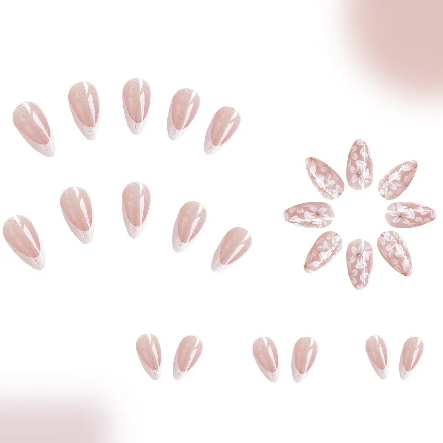 Removable short almond artificial nails with French style glitter flower design in colour C625