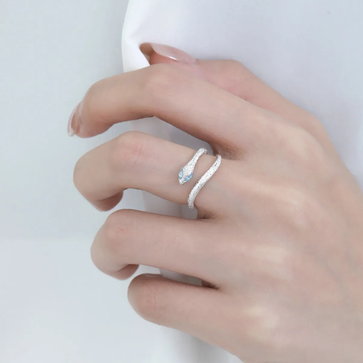 Silver electroplated snake ring with adjustable opening and platinum colour finish
