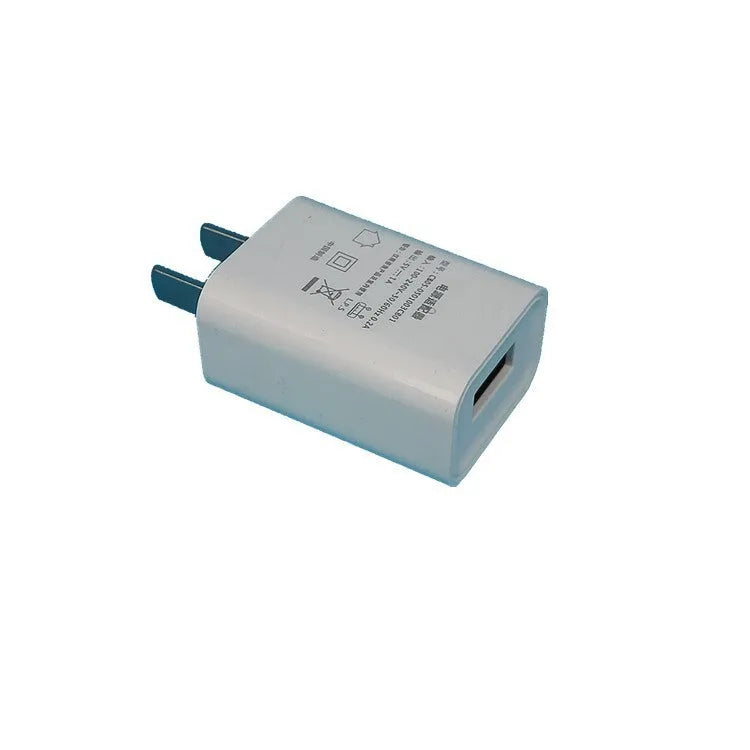 White USB wall charger adapter with 5V 1A output and CE FCC certification labels