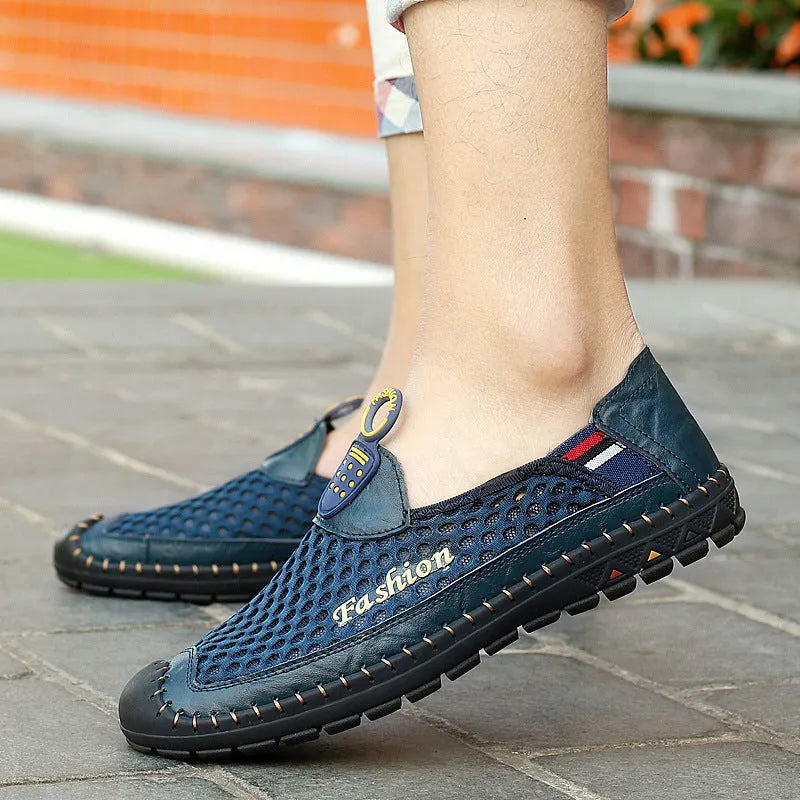 Men's brown mesh casual shoes with round toe and rubber sole on a white background.