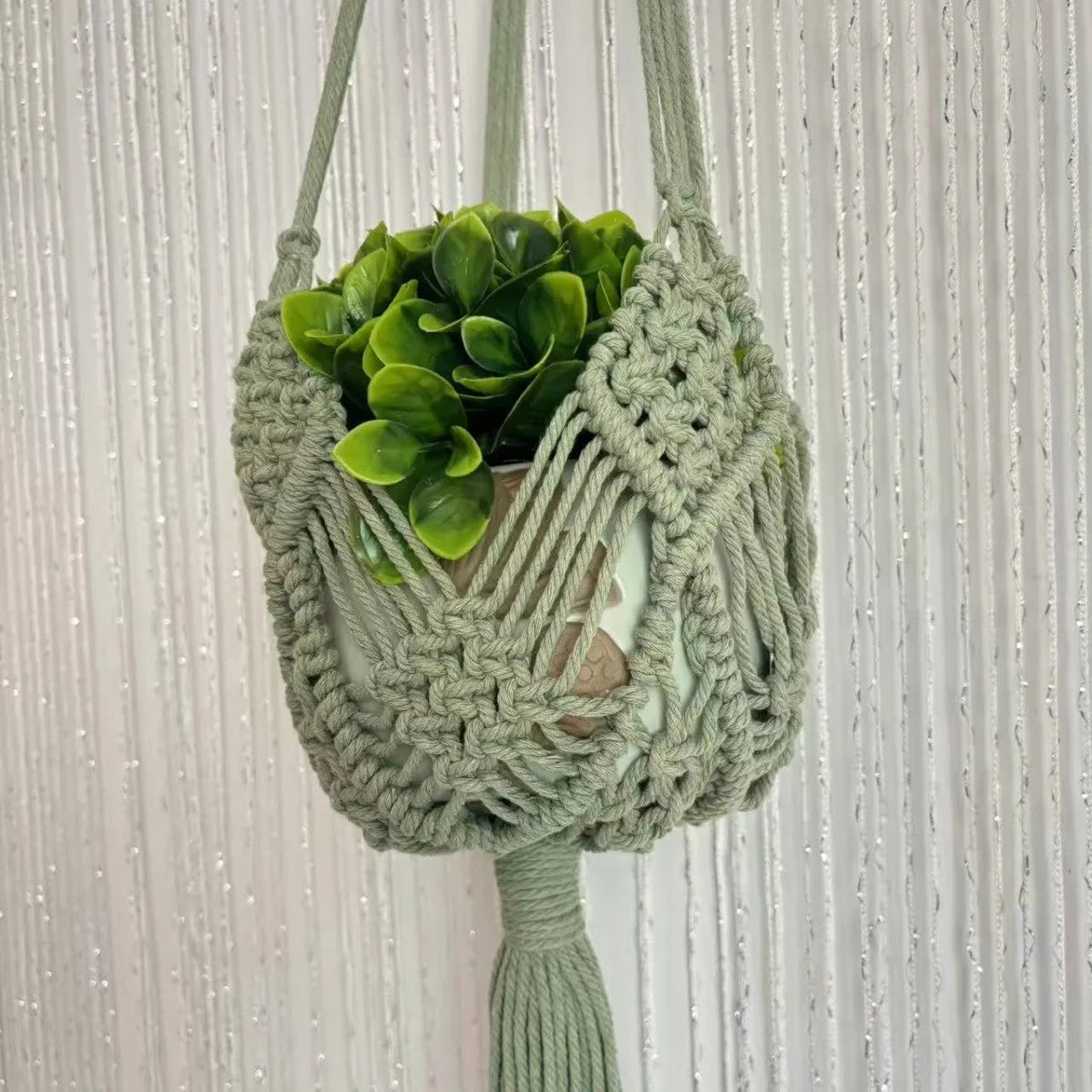 Hand-woven polyester cotton flower pot in brown colour displaying textured weave pattern