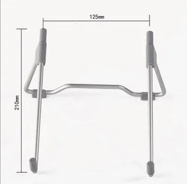 Grey aluminium alloy and plastic mobile phone stand laptop stand on a desk