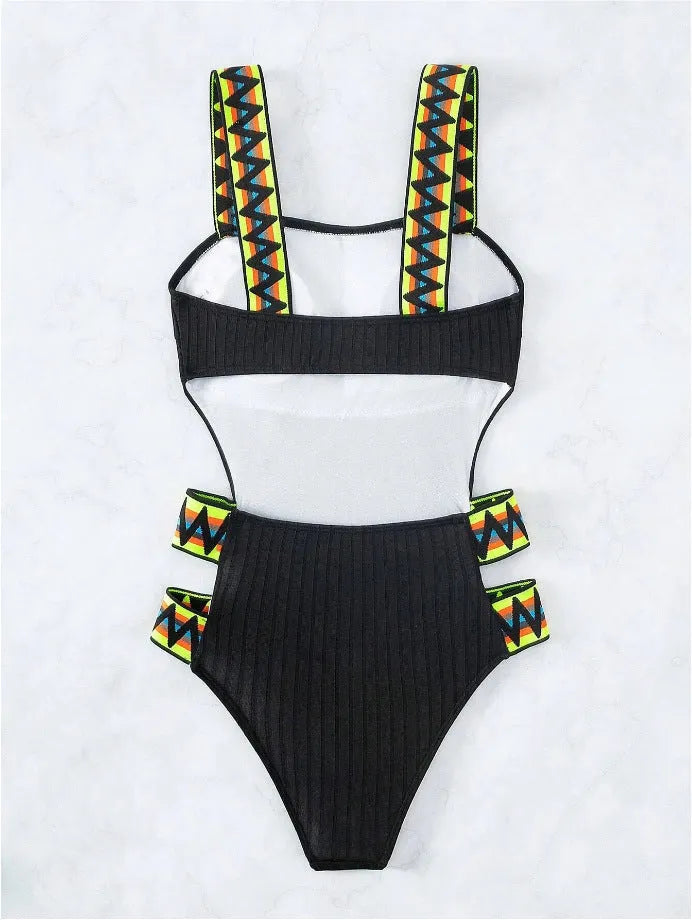 Women's solid colour one-piece swimsuit bikini in black or orange, made from polyester fabric.