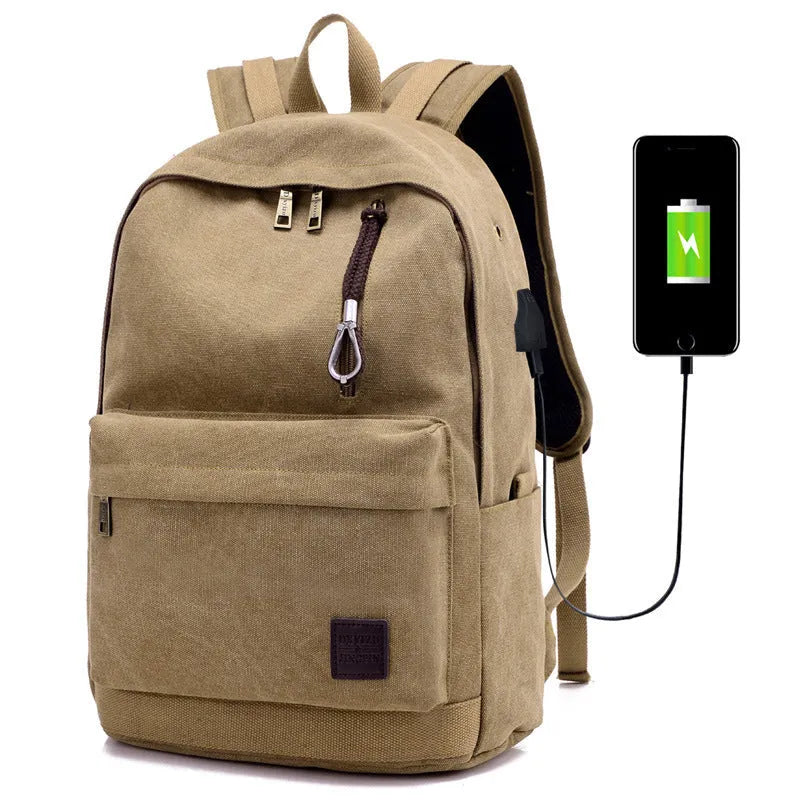 Canvas backpack in grey colour showing USB charging port, front zipper pocket, and adjustable shoulder straps