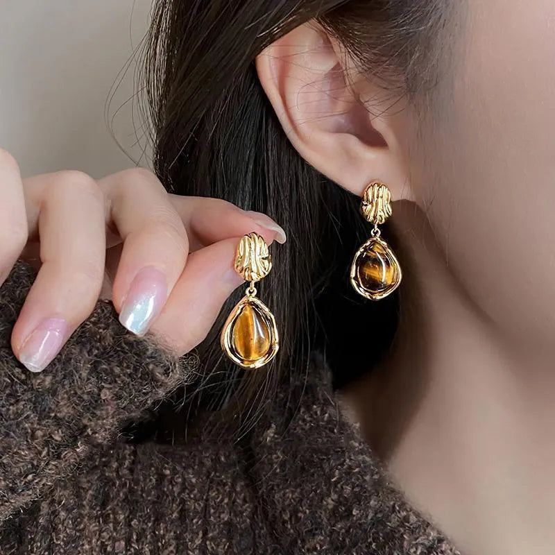 Handmade alloy geometric ear rings with electroplating in Maillard Amber and Tigereye styles featuring tassel details
